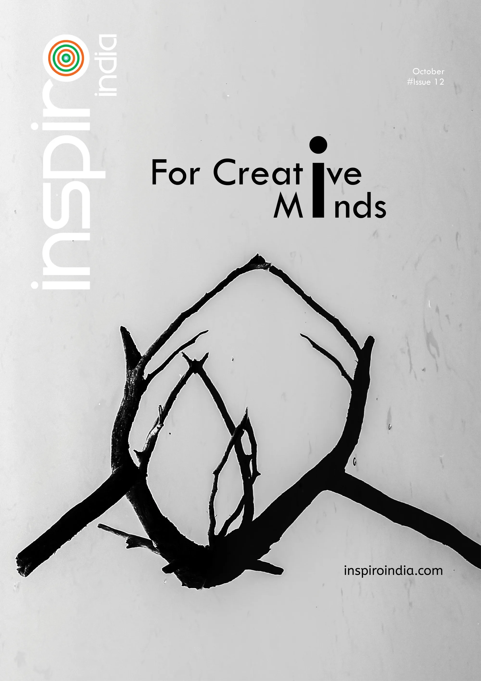 Inspiro magazine cover with For Creative Minds typography and abstract circular artwork