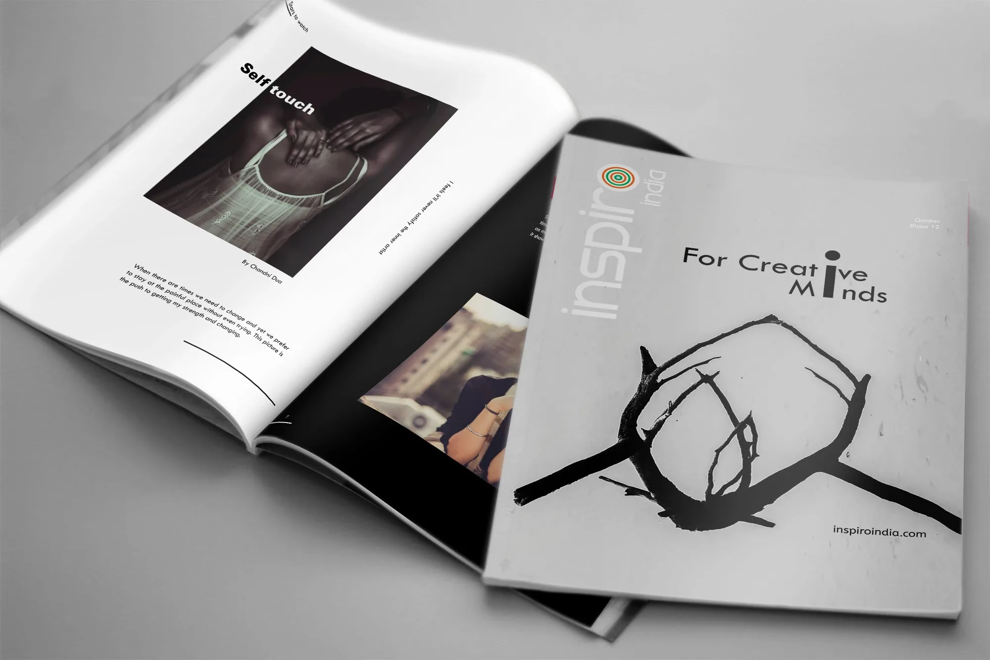 Magazine mockup showing cover and an open editorial spread