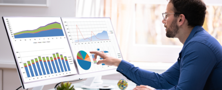UK business professional analysing AI search changes data on laptop, representing calm strategic approach to digital marketing adaptation